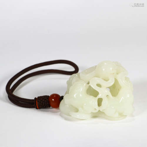 A Jade Carved Lions Pendant