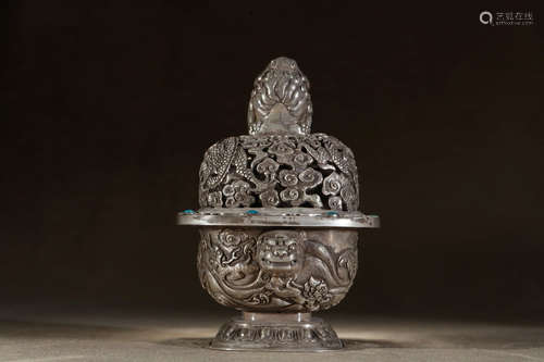 A Silver Auspicious Beast Piercing Incense Burner