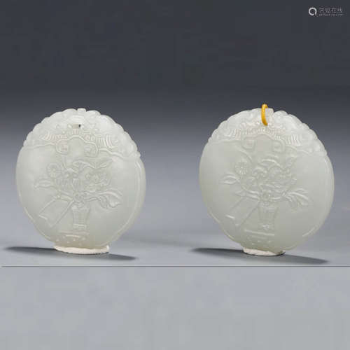 A Pair of White Jade Floral Inscribed Pendants