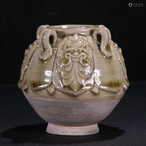 A Celadon Carved Jar