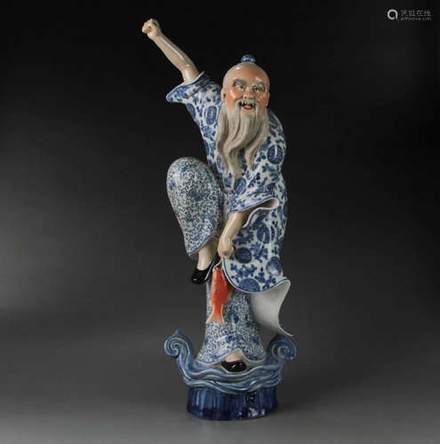 A Blue and White Porcelain Fisherman Statue