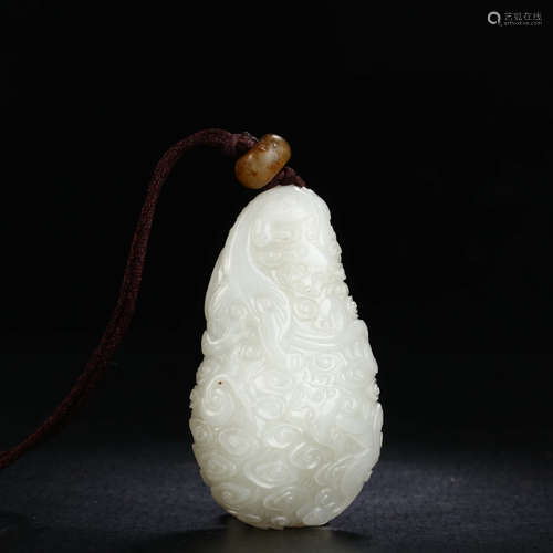 A Dragon Carved Hetian Jade Pendant