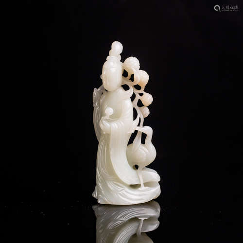 A White Jade Carved Magu Statue