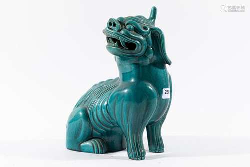 CHINE CHIEN de Fô en biscuit à couverte turquoise.…