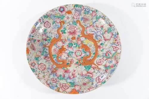 CHINE PLAT circulaire en porcelaine à décor polych…