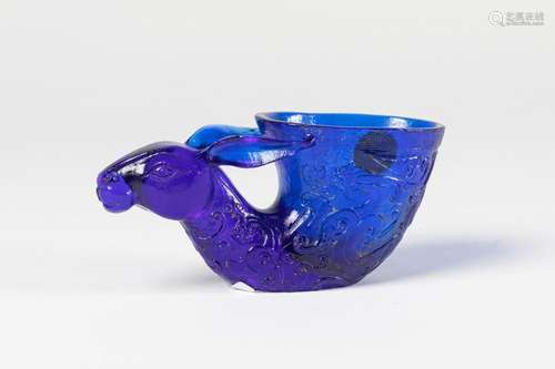 CHINA CUP in blue tinted zoomoprhe glass with scro…