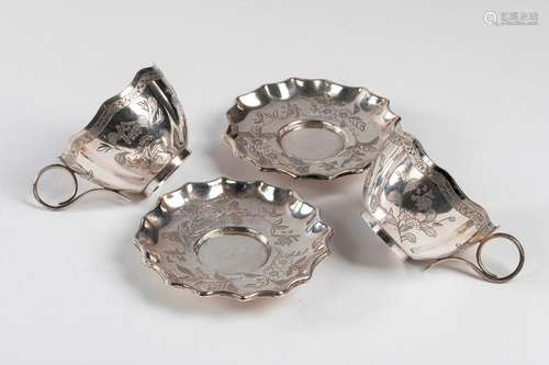 VIETNAM Two cups and saucers in chased silver with…