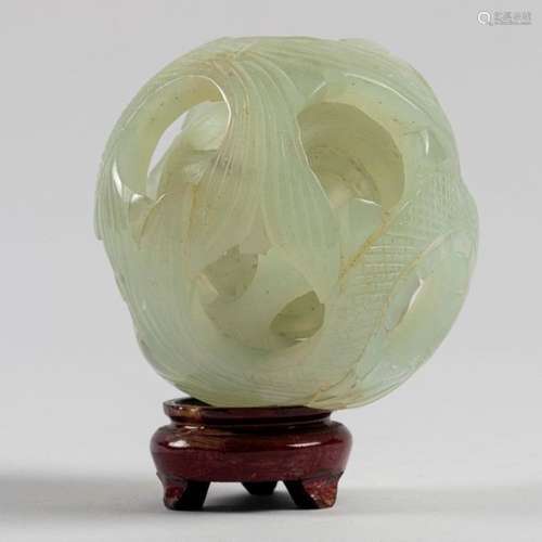 CHINA CANTON BALL in carved and incised serpentine…