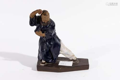 CHINA Man in motion, stoneware with polychrome roo…