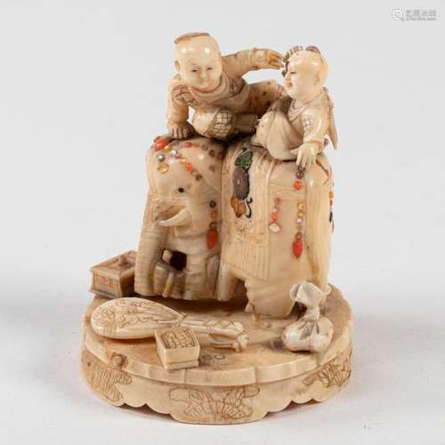 JAPAN OKIMONO, carved and patinated ivory represen…