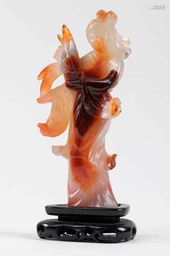 CHINA Elegant standing, carved agate, white shaded…