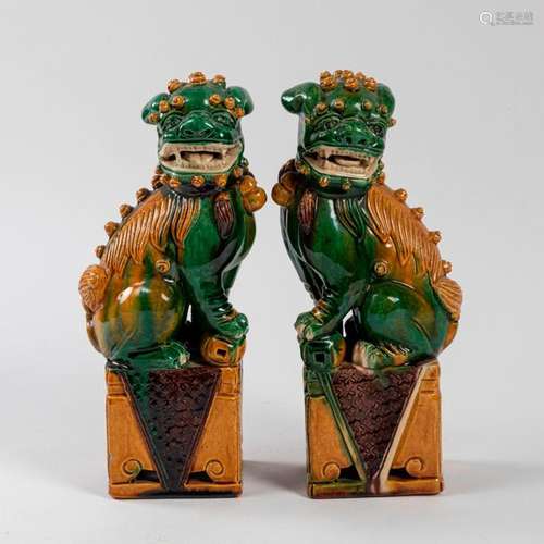 CHINA Pair of Fô DOGS in biscuit and Sancai enamel…