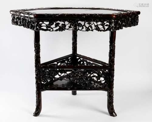 TABLE in carved iron wood, the hexagonal top, the …