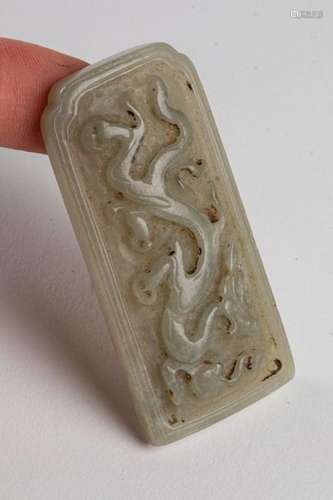 CHINA Sculpted and shaded green jade plate of the …