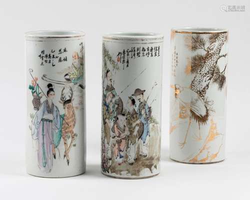 CHINA Suite of three porcelain scroll VASES with p…