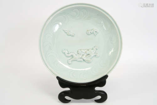 antique Chinese dish in marked celadon porcelain with a dragon's decor - with a nice [...]