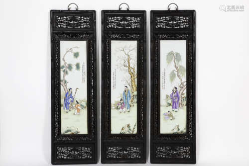 series of three Chinese panels in sculpted wood and porcelain with polychrome 