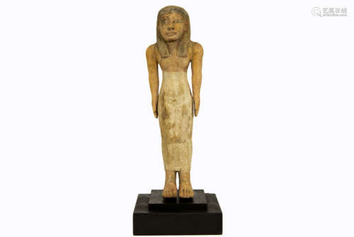 Ancient Egyptian New Kingdom period funerary male figure sculpture in wood with [...]