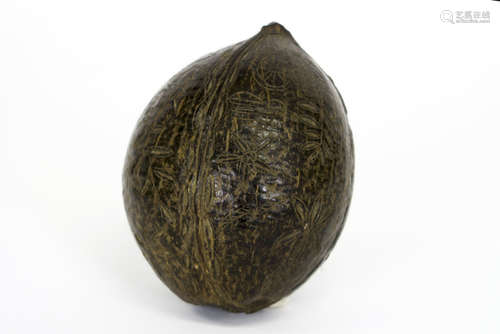 antique Caribbean gunpowder container made from a coconut with carved motifs - - [...]