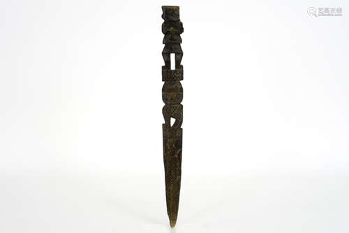 pre-columbian utensil used while weaving, in wood with sculpted antropomorphic and [...]