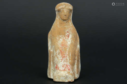 Ancient Greece tomb figure in earthenware with remains of the original polychromy - [...]