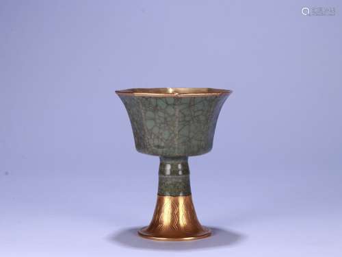 A Porcelain Longquan Kiln Cup With Gilding