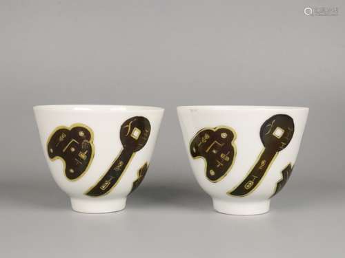 Pair Of Porcelain Green-Coin Glazed Cups