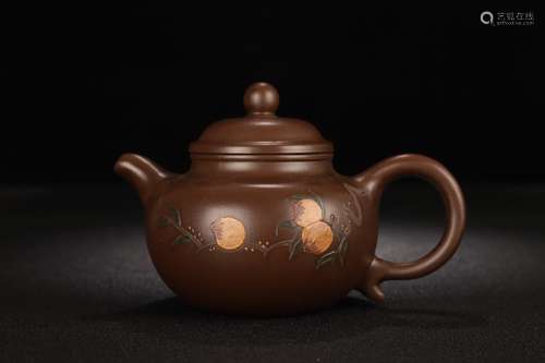 A Zisha Teapot With Peach Carving