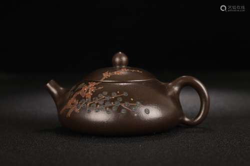 A Zisha Teapot With Floral Caving