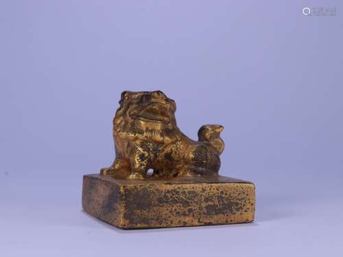 A Bronze Lion Seal With Gold Painting