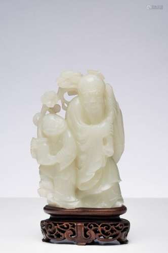 CHINE XVIIIème siècle. Statuette en jade blanc lég…