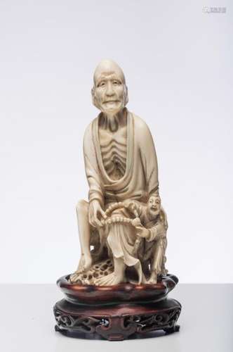 CHINE, VERS 1900. Statuette en ivoire, représentan…