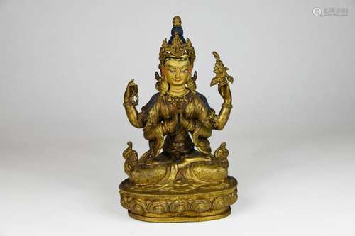 TIBET VERS 1900. Statuette en bronze doré, représe…