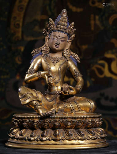 A GILT BRONZE CASTED BUDDHA SHAPE STATUE