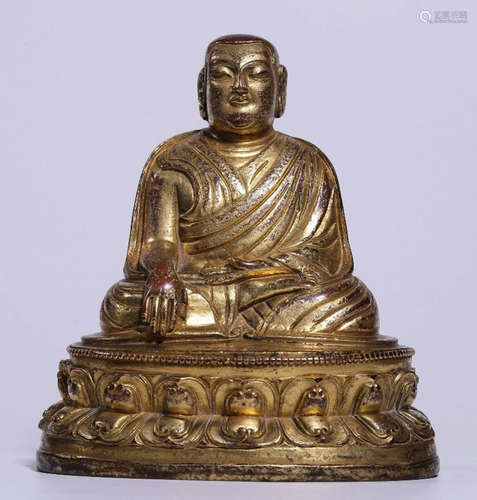 A GILT BRONZE CASTED BUDDHA SHAPE STATUE