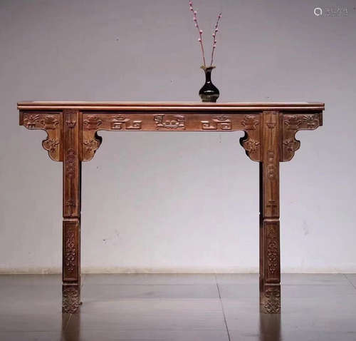 A TAN WOOD WITH MARBLE CARVED DESK