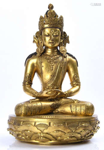 A GILT BRONZE CASTED BUDDHA SHAPE STATUE