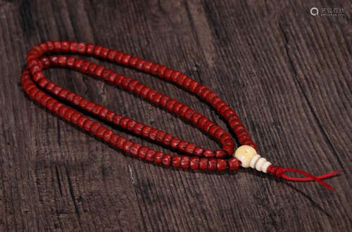 A TIBETAN CINNABAR BODHI BEADS STRING NECKLACE