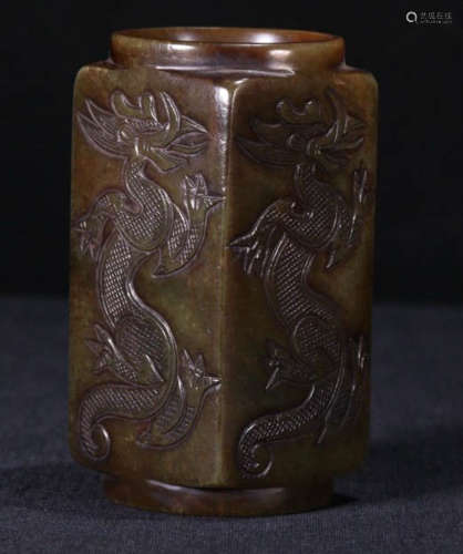 AN ANTIQUE JADE CARVED DRAGON PATTERN CONG PENDANT