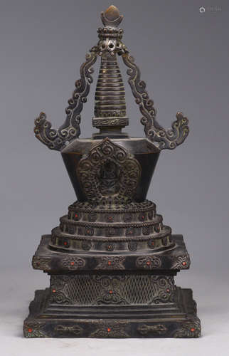 A COPPER CASTED PAGODA