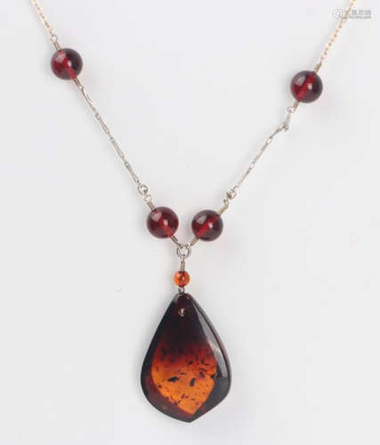 A SILVER WITH AMBER NECKLACE