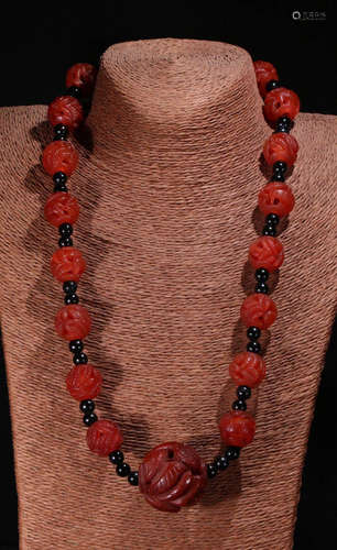 AN AGATE CARVED AUSPICIOUS PATTERN NECKLACE