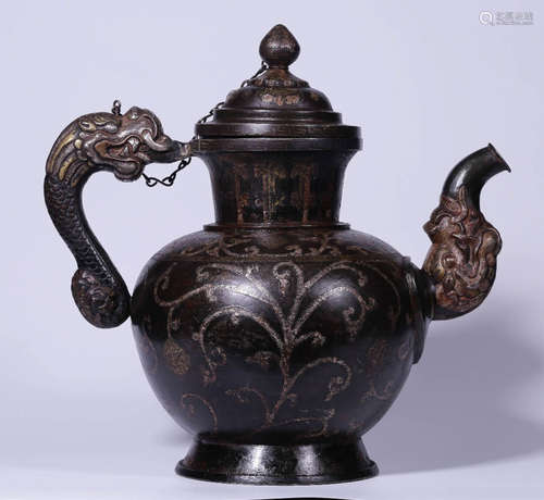 A TIBETAN COPPER WITH SILVER FLOWER PATTERN TEAPOT