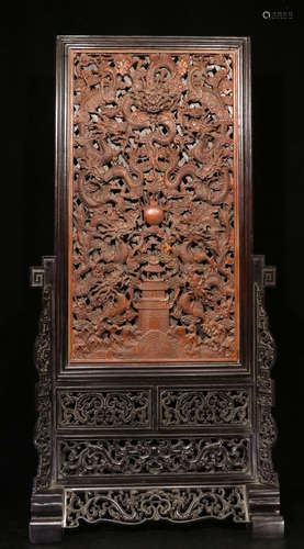 A BAMBOO CARVED DRAGON PATTERN SCREEN