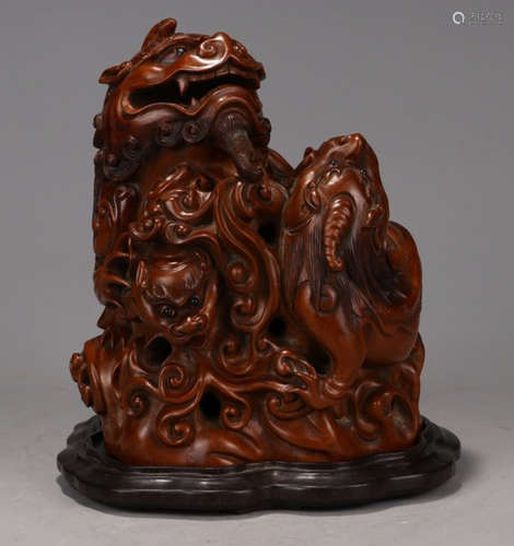 A HUANGYANG WOOD CARVED PIXIU BEAST SHAPE CENSER