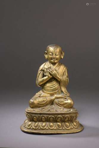 TIBET XVIIe siècle Statuette en bronze doré de lam…