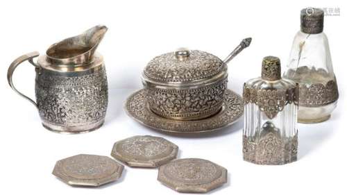 Southeast Asia: A SILVER SILVER SET WITH FLORAL DE…