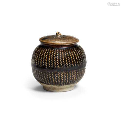A brown glazed cizhou molded jar and cover Song/Jin dynasties, 11th/12th century