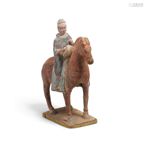 A grey painted pottery horse and rider Northern Wei period