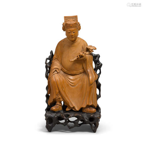 A boxwood seated figure of a Wenchang Qing dynasty